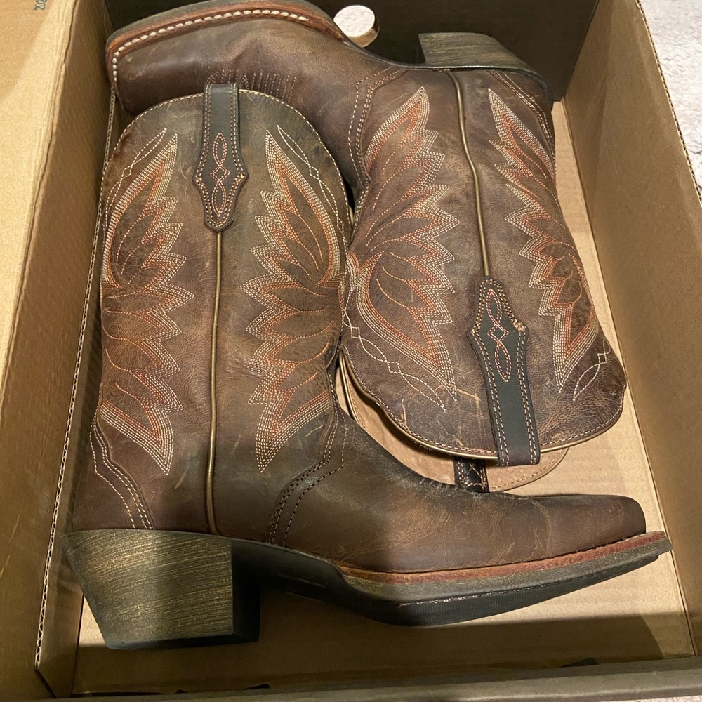 Heeled western boots.